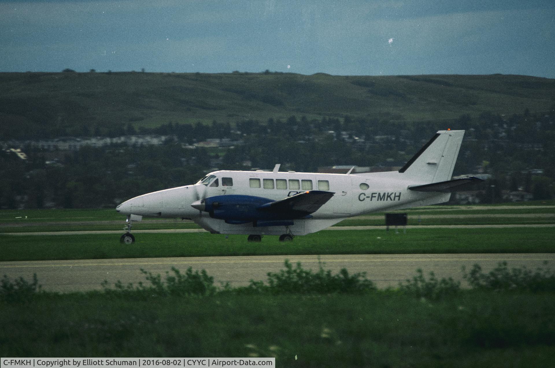C-FMKH, 1968 Beech 99 C/N U-12, Rainy day in Calgary