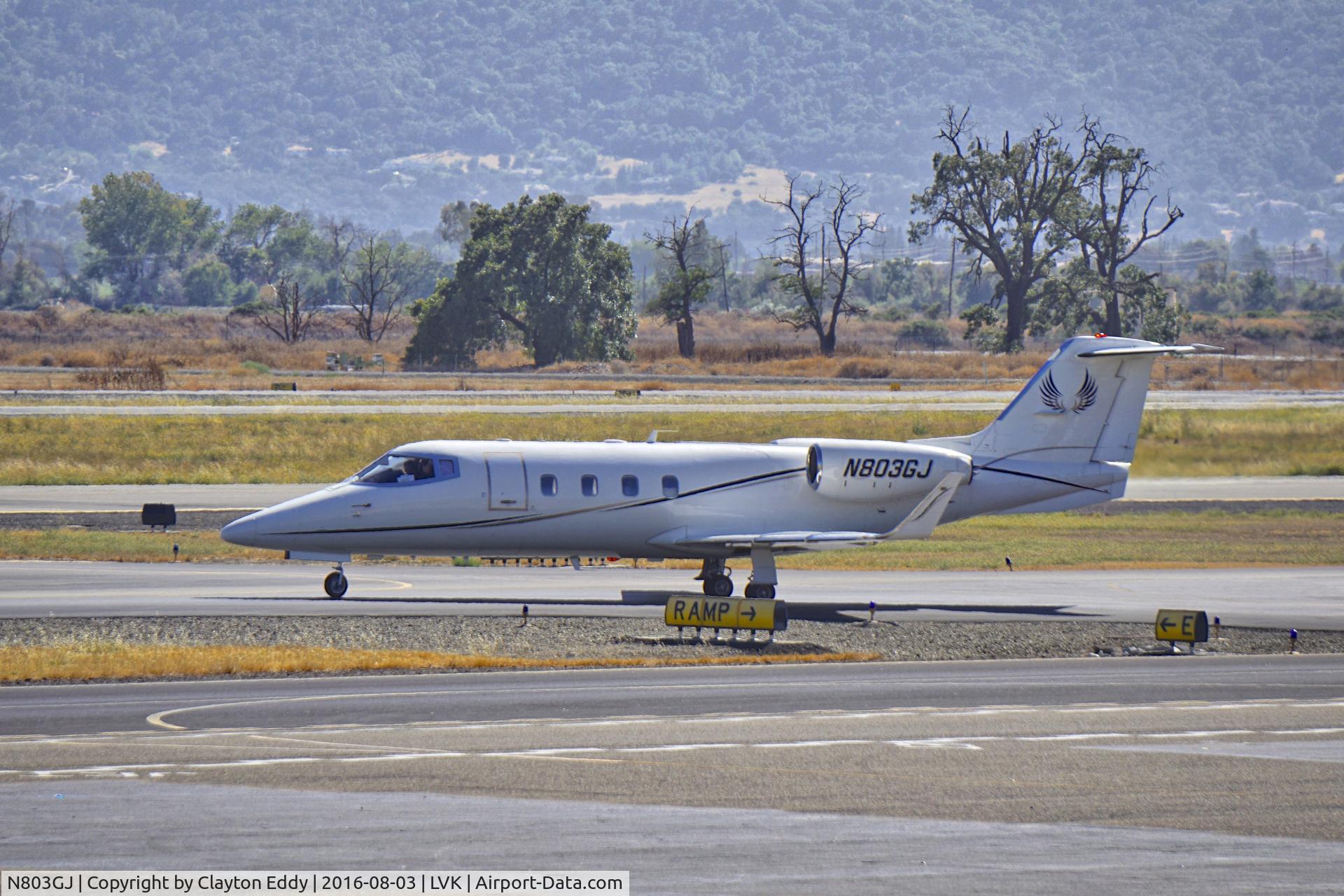 N803GJ, 2013 Gates Learjet 55 C/N 115, Learjet 55 N803GJ departing Livermore airport, California. 2016.