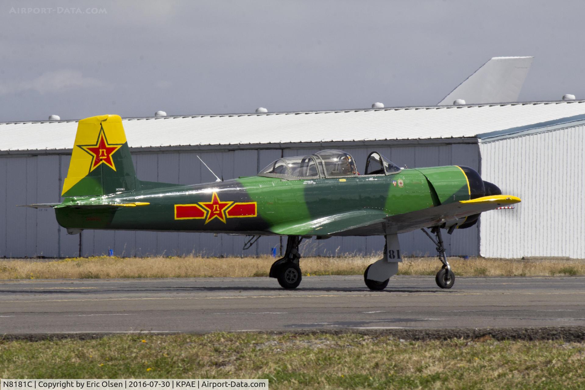 N8181C, 1973 Nanchang CJ-6A C/N 2432061, CJ-6 taxing by after formation flying with 2 other CJ-6's.