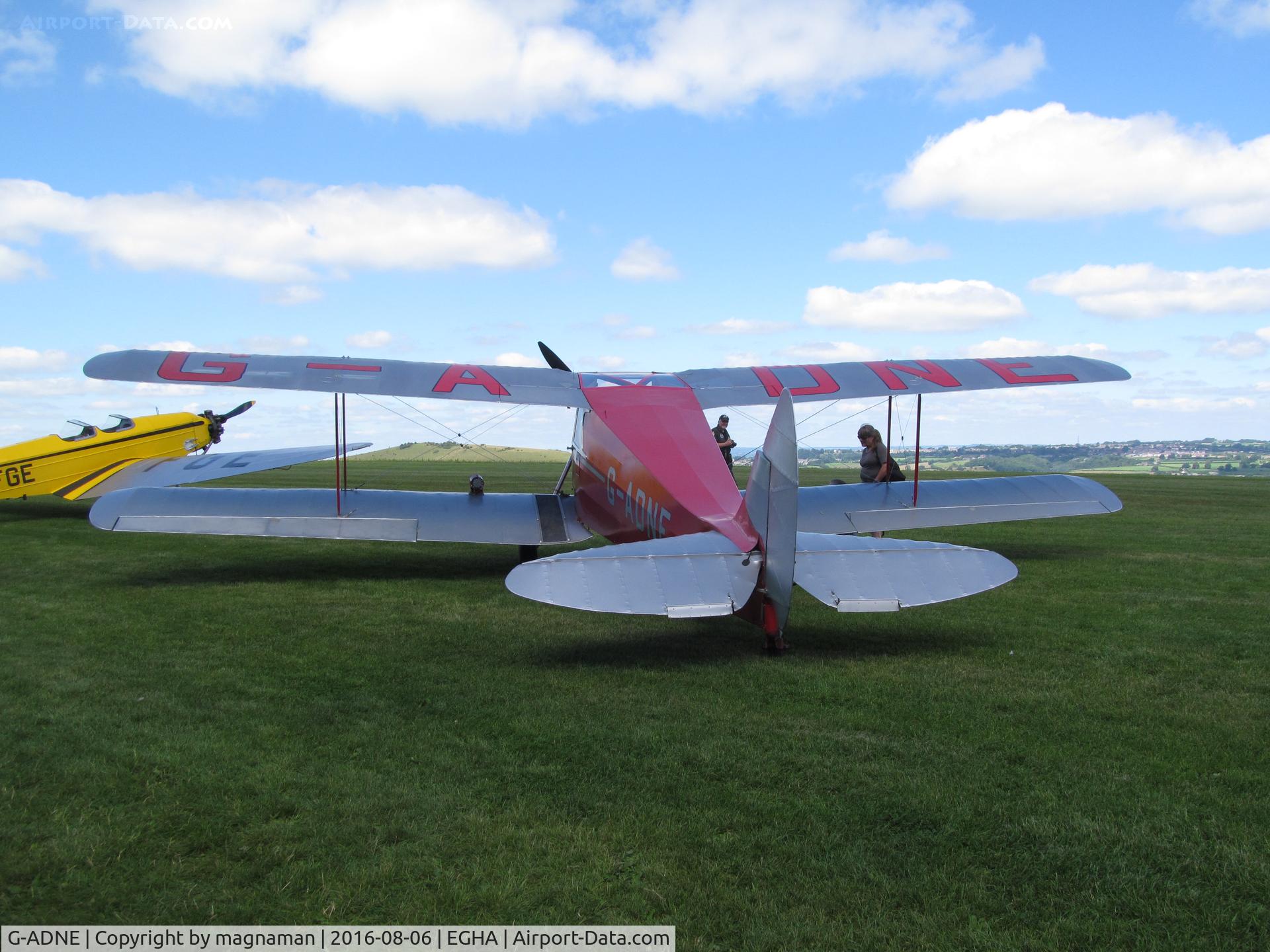 G-ADNE, 1936 De Havilland DH.87B Hornet Moth C/N 8089, by café at compton