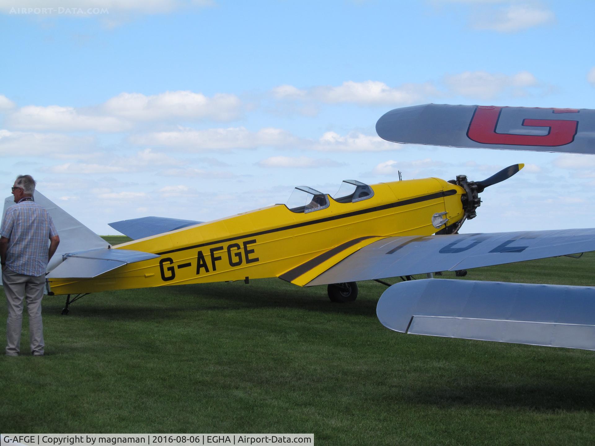 G-AFGE, 1937 British Aircraft Manufacturing Company Ltd Swallow 2 C/N 470, on grass by cafe