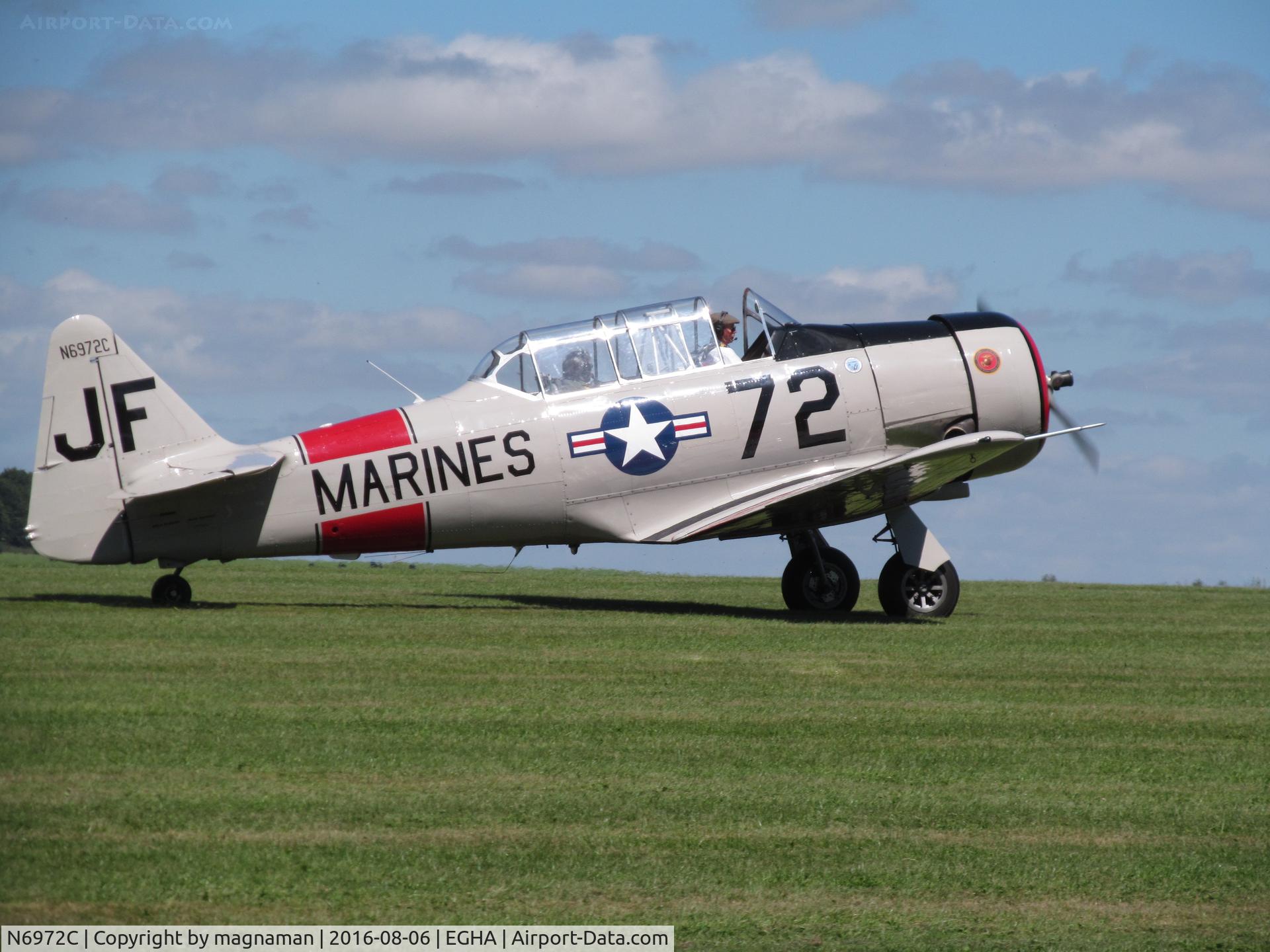 N6972C, 1946 North American SNJ-5 Texan Texan C/N 90680, leaving for another pleasure flight