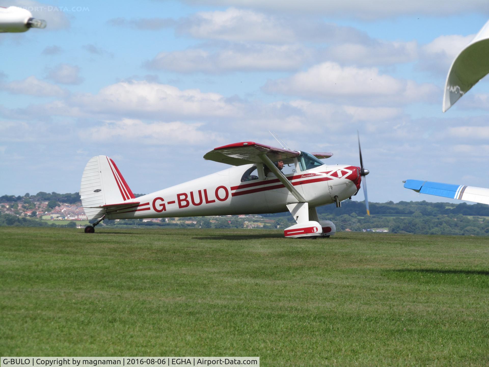 G-BULO, 1946 Luscombe 8F Silvaire C/N 4216, taxying past parked aircraft
