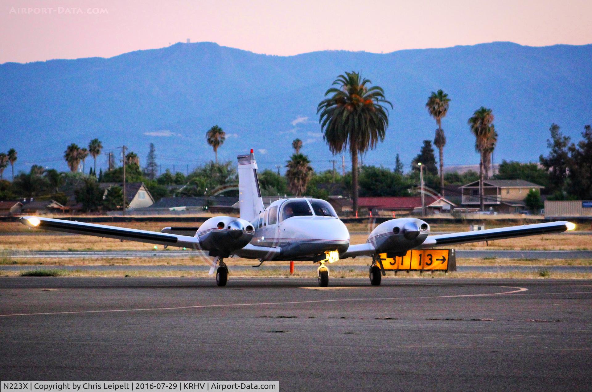 N223X, Piper PA-34-200T C/N 34-7970288, Locally-based Piper PA-34-200T taxing in at sunset after landing at Reid Hillview Airport, San Jose, CA.