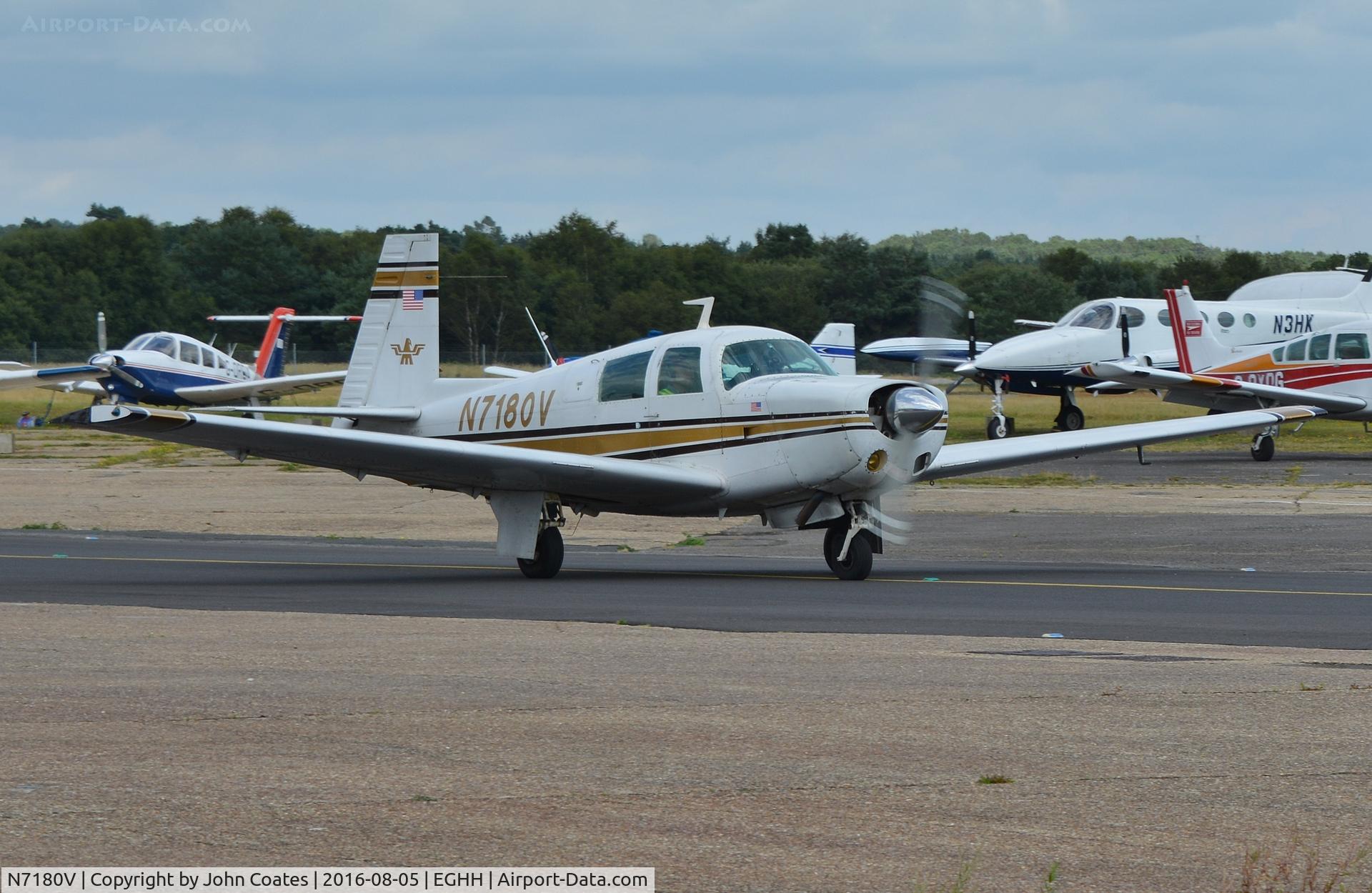 N7180V, 1974 Mooney M20E C/N 21-0060, Taxiing to depart European Avn