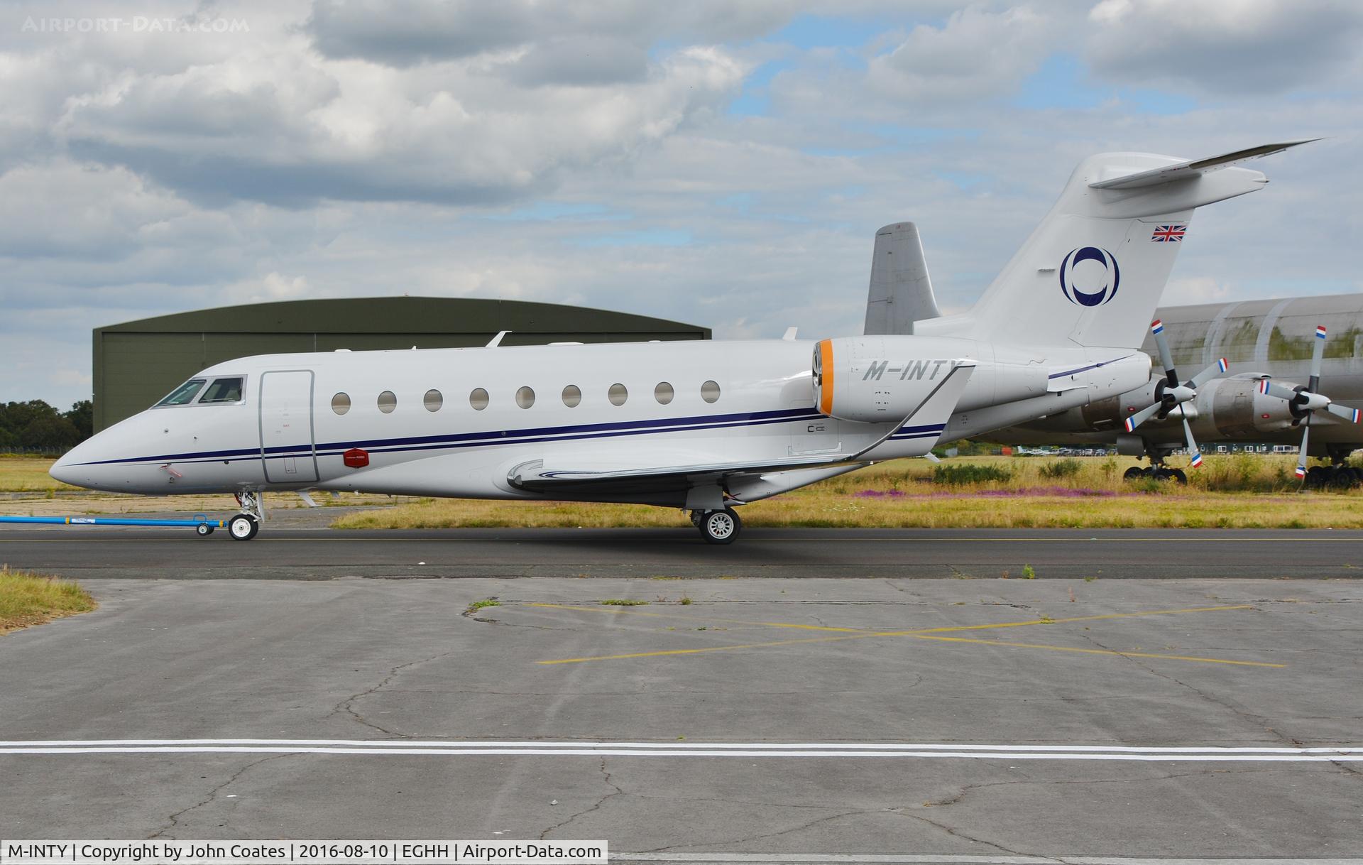 M-INTY, 2015 IAI Gulfstream G280 C/N 2086, Being towed to Thurston Avn