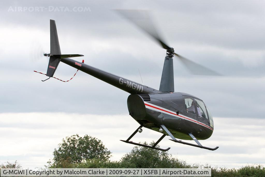 G-MGWI, 2000 Robinson R44 Astro C/N 0663, Robinson R44 Astro, Fishburn Airfield, September 27th 2009.