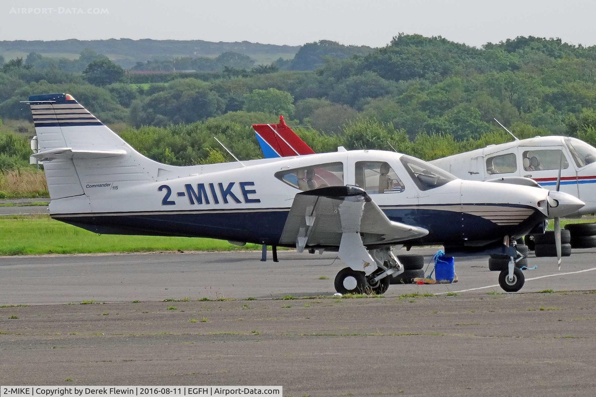 2-MIKE, 2000 Rockwell Commander 114B C/N 14676, Commander, Guernsey Channel Islands based, previously N6048B, seen parked up.
