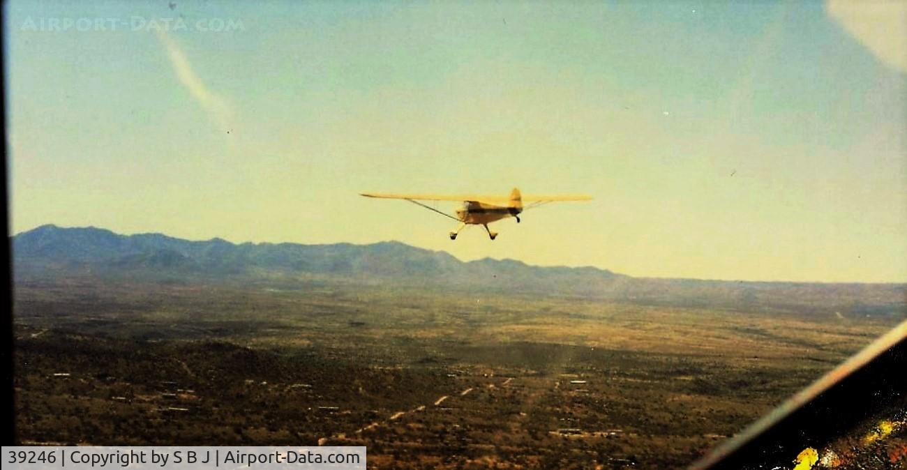 39246, 1945 Taylorcraft BC-12D Twosome C/N 6500, 246 as it nears the New Mexico border flying eastward.