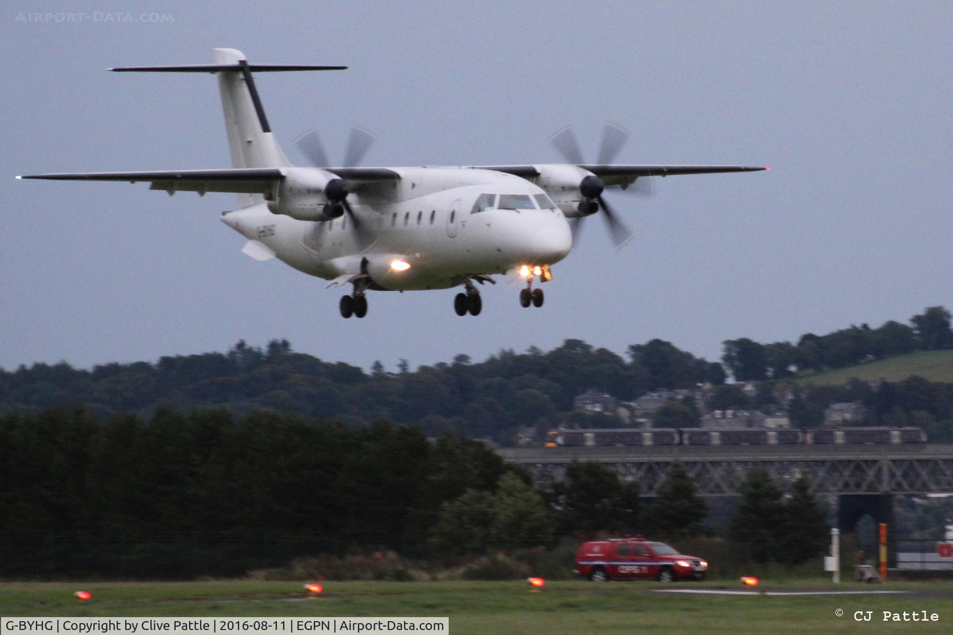 G-BYHG, 1998 Dornier 328-100 C/N 3098, Landing at Dundee in the failing light.