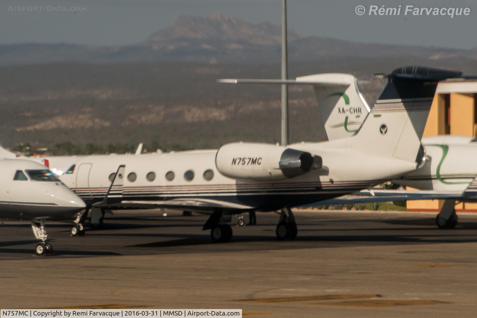 N757MC, 2002 Gulfstream Aerospace G-IV C/N 1498, Parked in private jet alley. Apologies for the poor quality, taken from another aircraft.