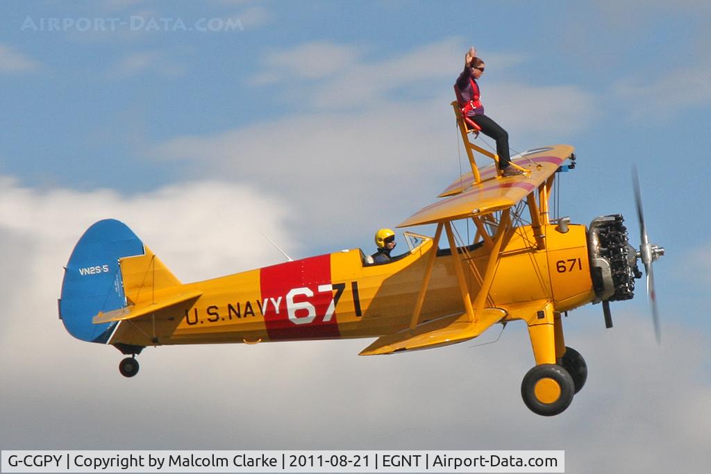 G-CGPY, 1945 Boeing E75N1 C/N 75-5303, Boeing E75N1 on wing walking duties during The Real Aeroplane Company's Summer Madness Fly-In, Breighton Airfield, August 21st 2011.