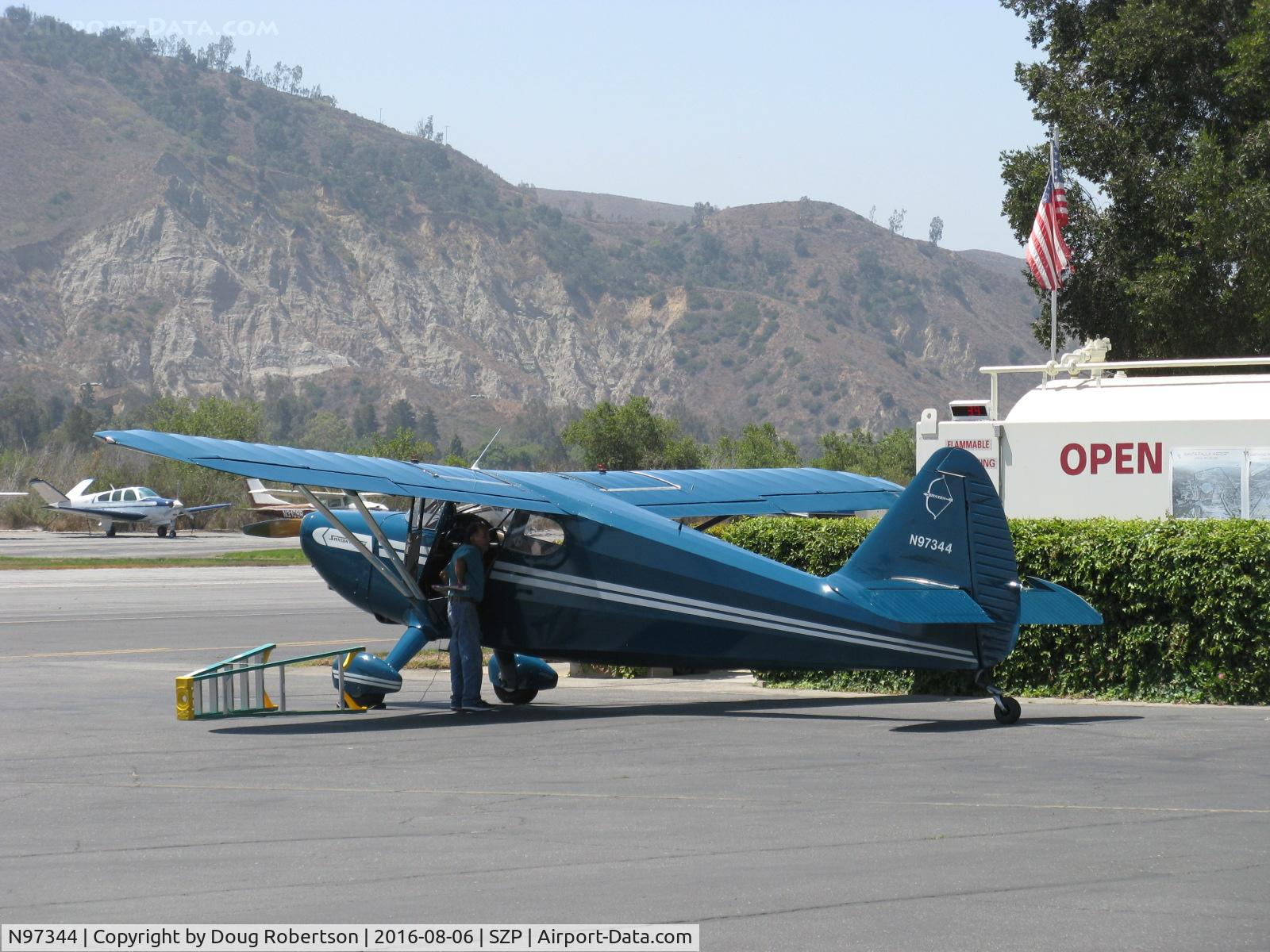 N97344, 1946 Universal Stinson 108 Voyager C/N 108-344, 1946 Universal Stinson 108 VOYAGER, Franklin 6A4165 165 Hp, at Fuel Dock with local A&P looking it over.