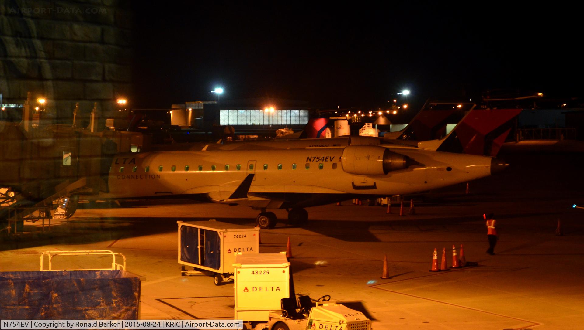 N754EV, 2004 Bombardier CRJ-701 (CL-600-2C10) Regional Jet C/N 10173, At the gate Richmond