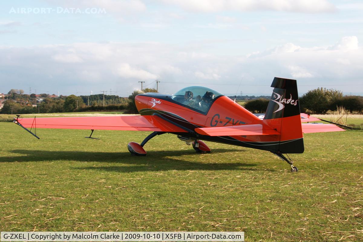 G-ZXEL, 2006 Extra EA-300L C/N 1224, Extra EA-300L, One of the Blades Aerobatic Team at Fishburn Airfield, October 10th 2009.