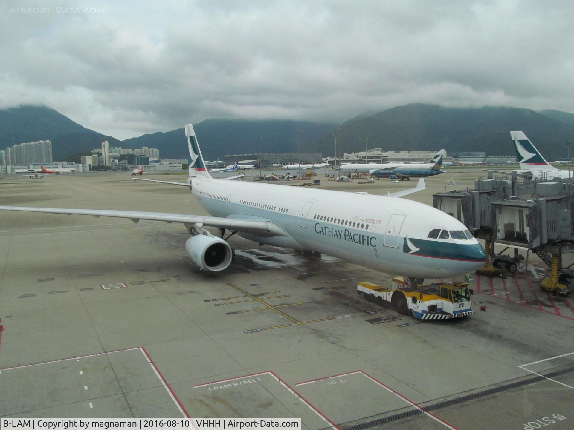 B-LAM, 2011 Airbus A330-343X C/N 1239, on stand at HKG