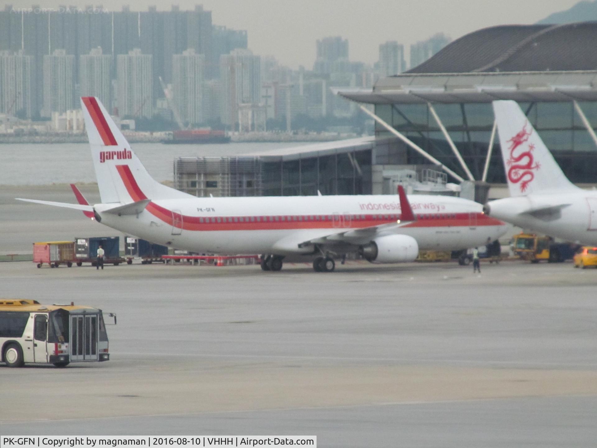 PK-GFN, 2011 Boeing 737-86N C/N 38033/3607, nice retro scheme - shame a bit fuzzy due to glass
