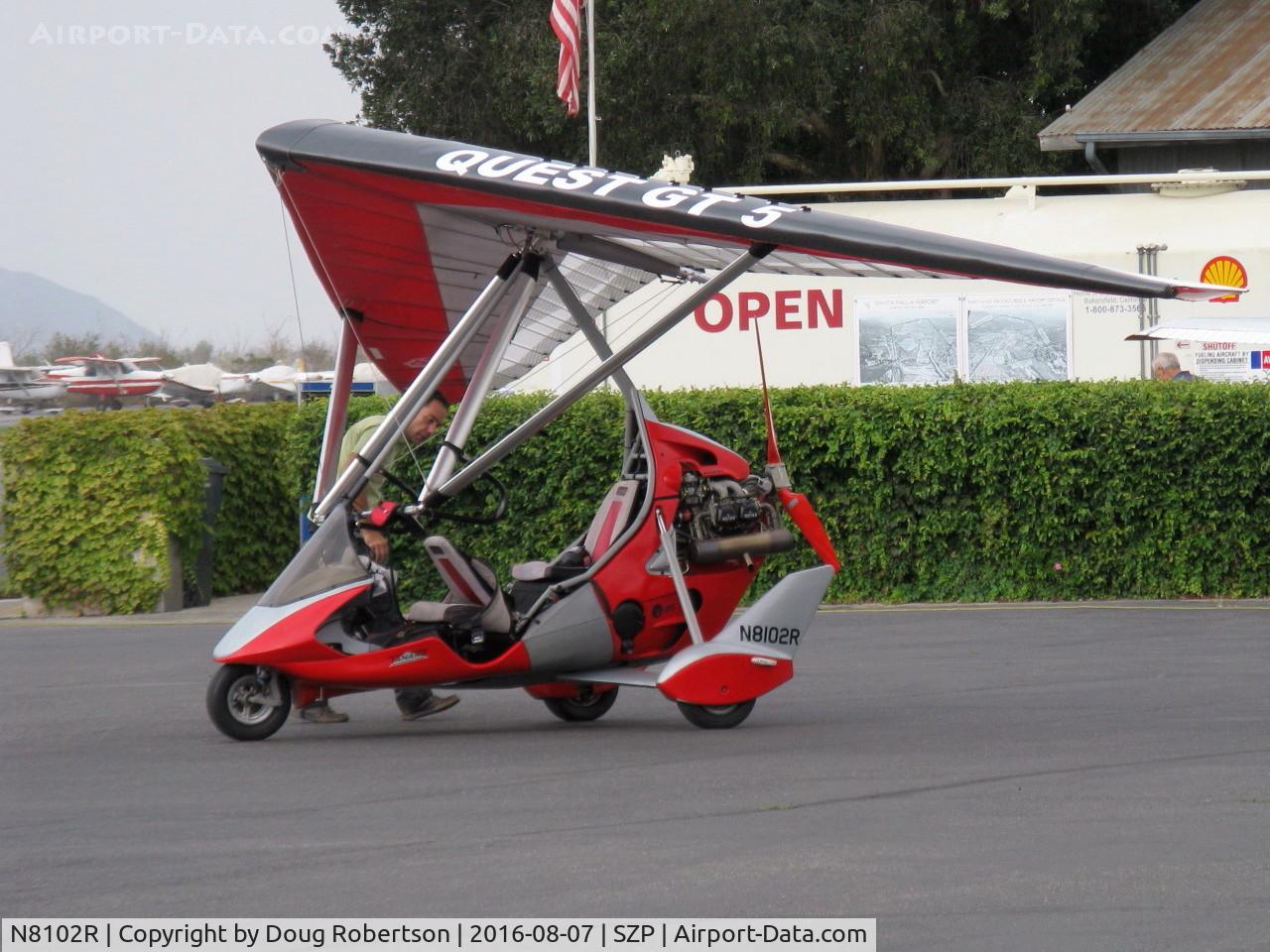 N8102R, 2005 Air Creation Tanarg C/N T05052, 2005 Air Creation USA TANARG, Rotax 912 4 stroke pusher, Experimental class weight-shift control, spotting the aircraft on transient ramp. Ignore wing markings.