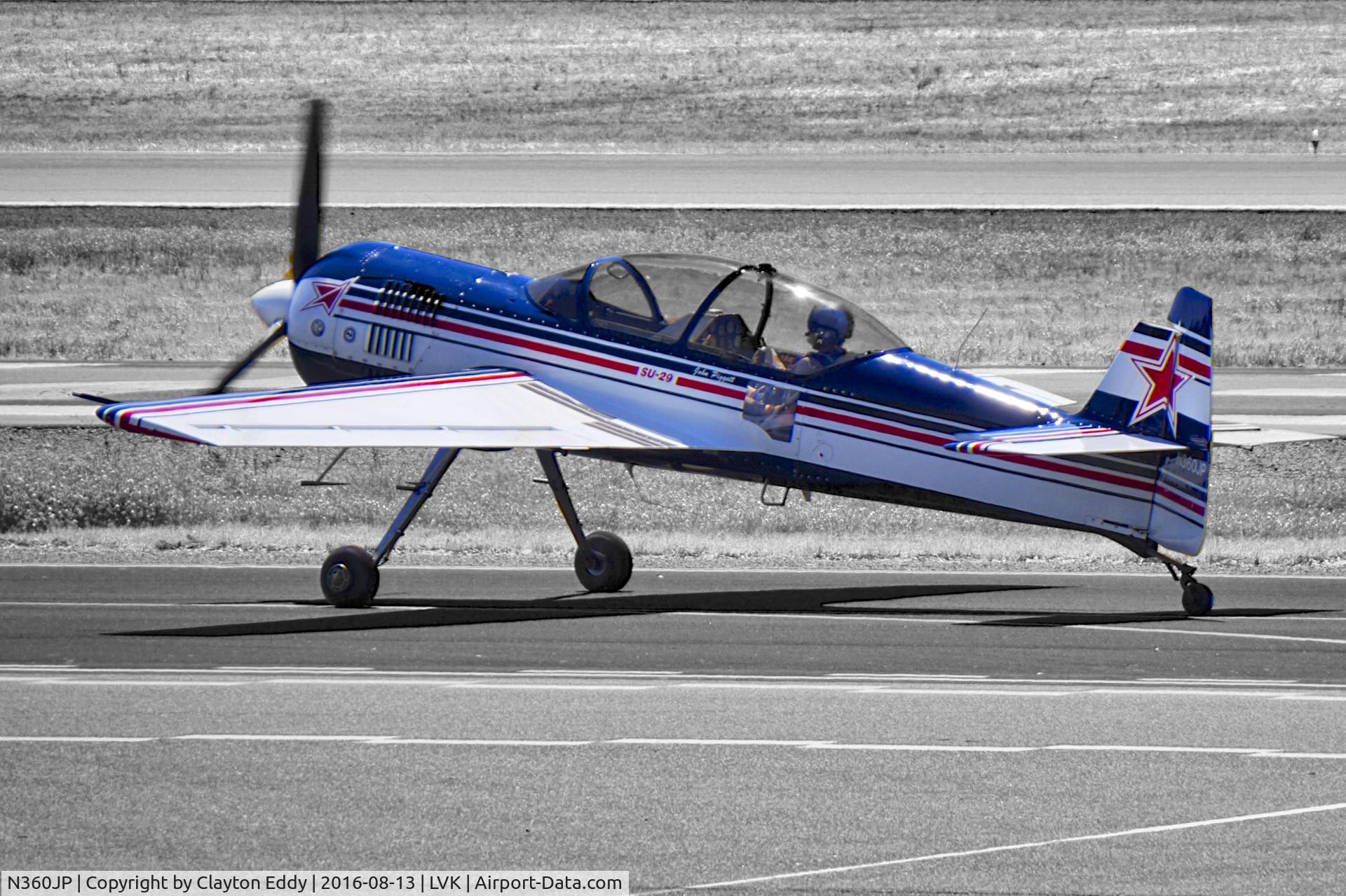 N360JP, Sukhoi Su-29 C/N 74-01, N360JP taxiing at Livermore Airport in California. 2016.