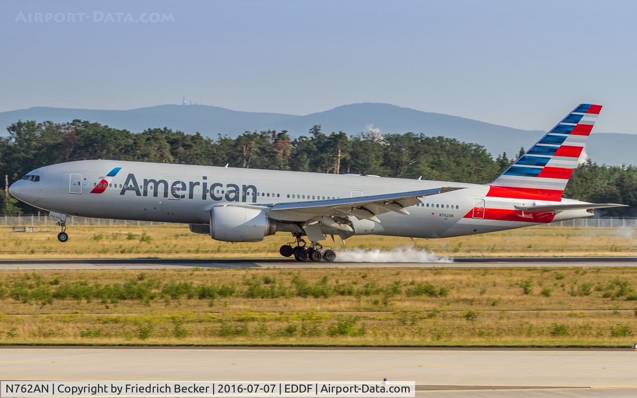 N762AN, 2002 Boeing 777-223 C/N 31479, touchdown on RW25R