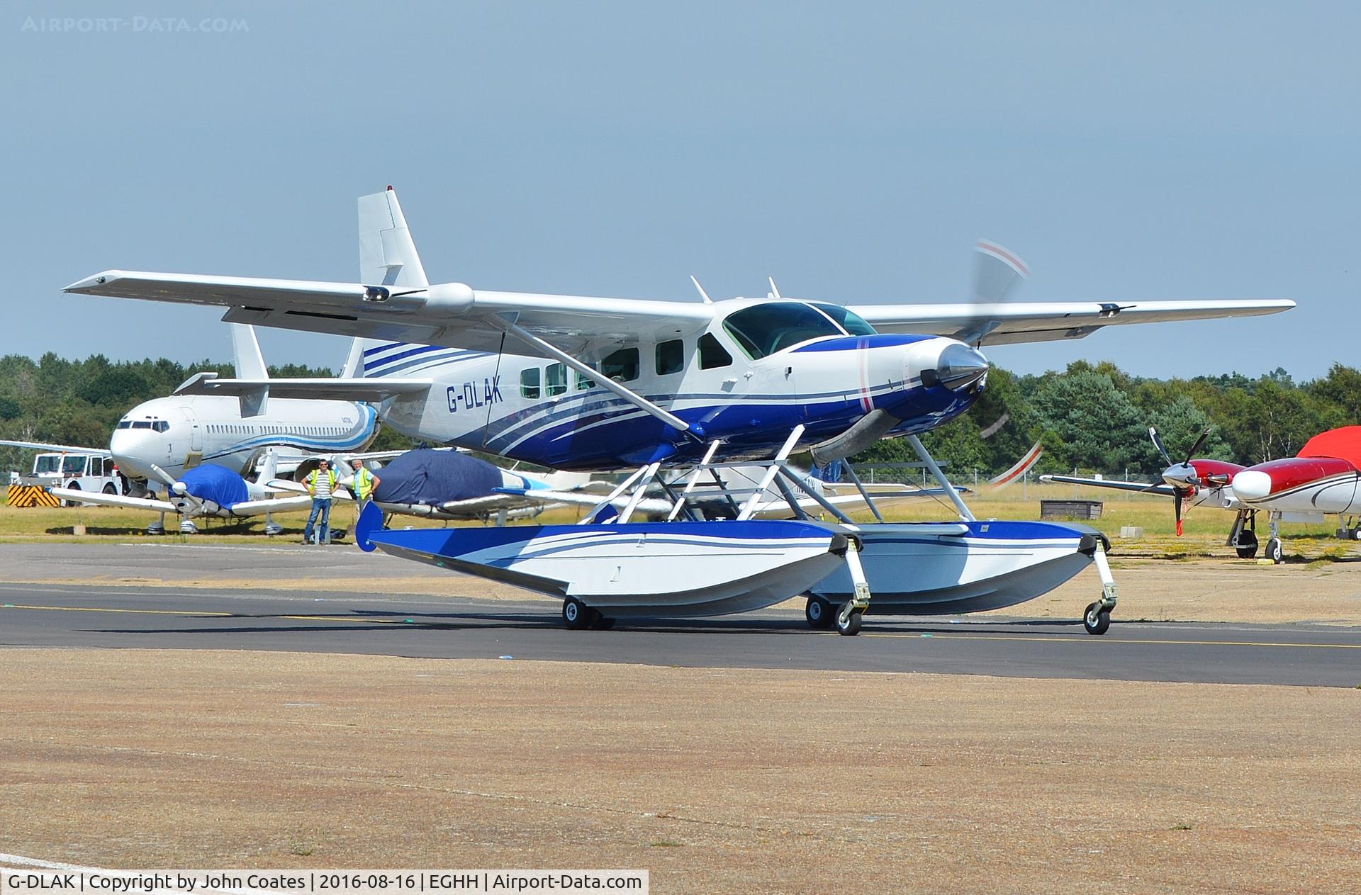 G-DLAK, 2001 Cessna 208 Caravan I C/N 20800340, Taxiing to depart after repaint