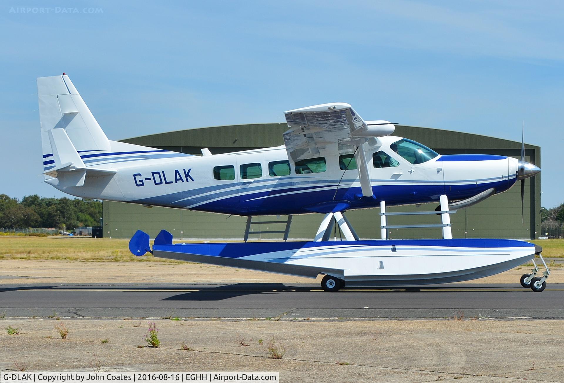 G-DLAK, 2001 Cessna 208 Caravan I C/N 20800340, Taxiing to depart home to Loch Lomond after repaint