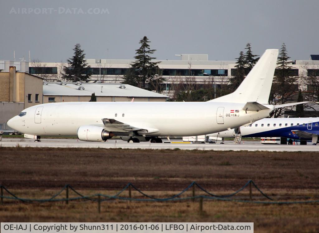 OE-IAJ, 1992 Boeing 737-476(SF) C/N 24440, Parked at the Cargo apron in all white without titles... operated by TNT Airways