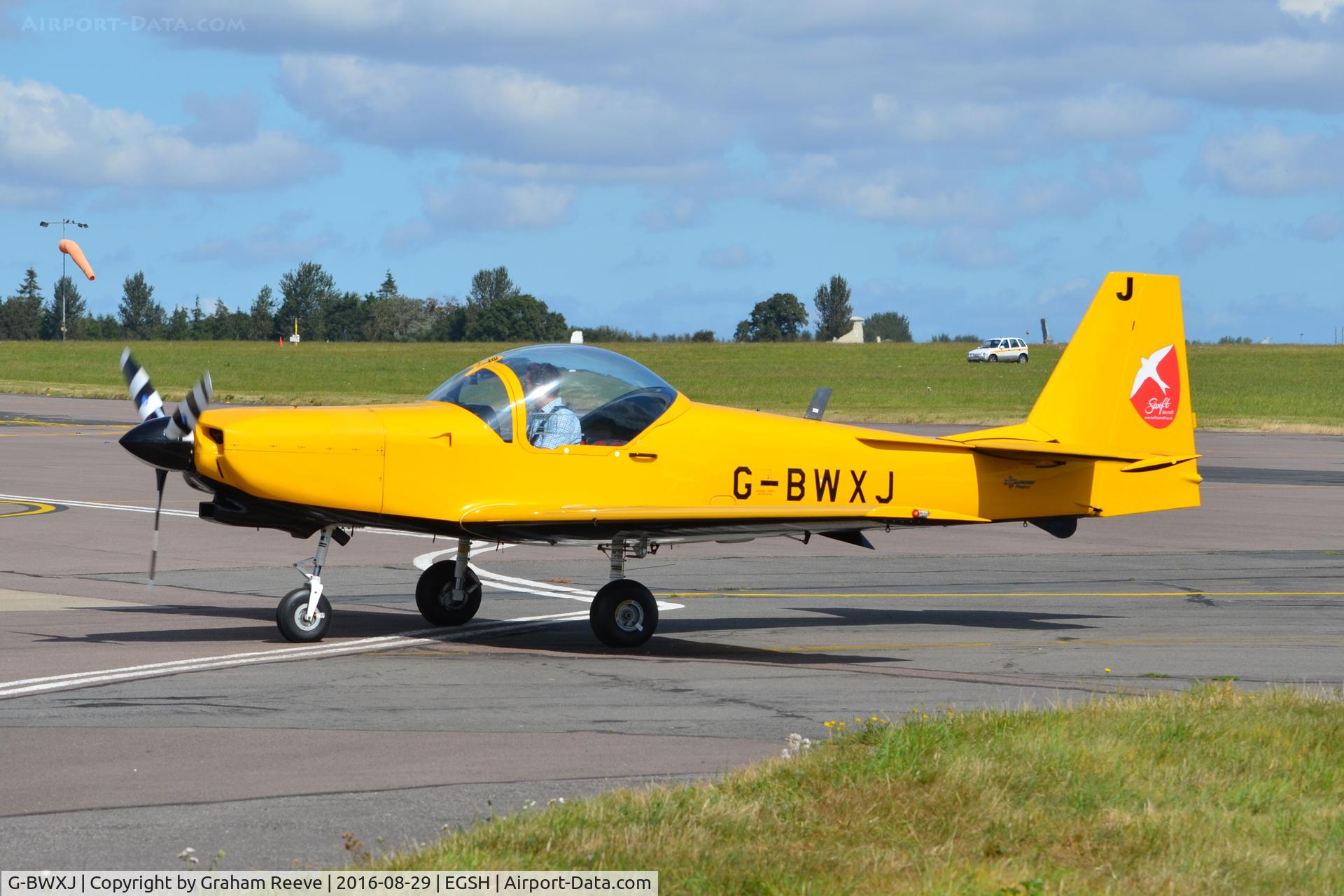 G-BWXJ, 1996 Slingsby T-67M-260 Firefly C/N 2245, Just landed at Norwich.