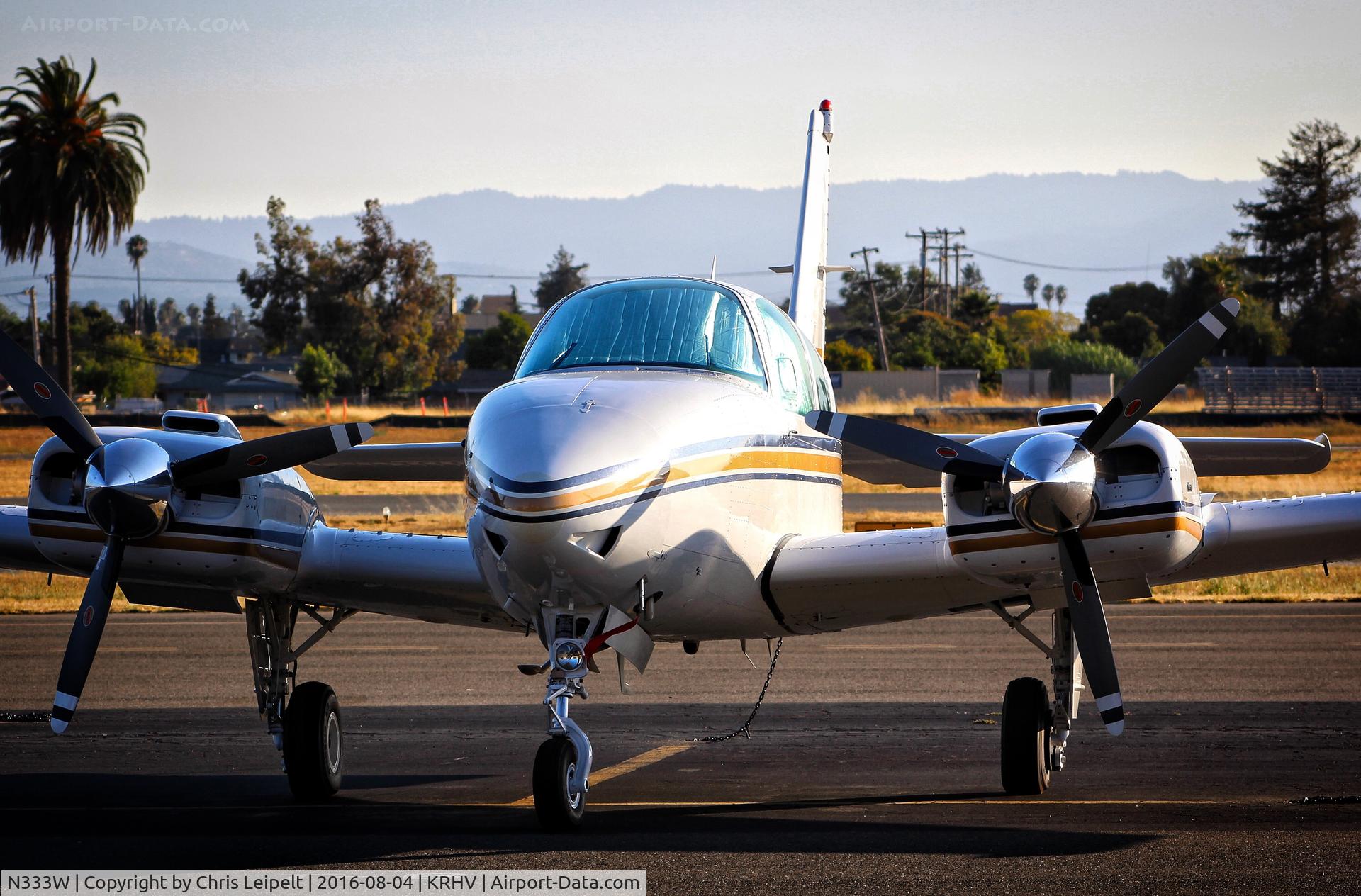 N333W, 1979 Beech E-55 Baron C/N TE-1172, Grecmar Air Inc (Wilmington, DE) 1979 Beechcraft Baron E-55 parked on the transient ramp during sunset at Reid Hillview Airport, San Jose, CA.
