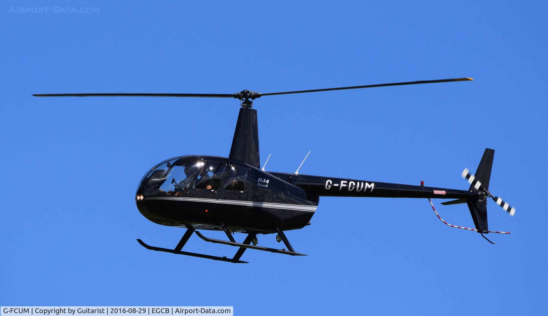 G-FCUM, 2007 Robinson R44 Raven II C/N 11723, At City Airport Manchester
