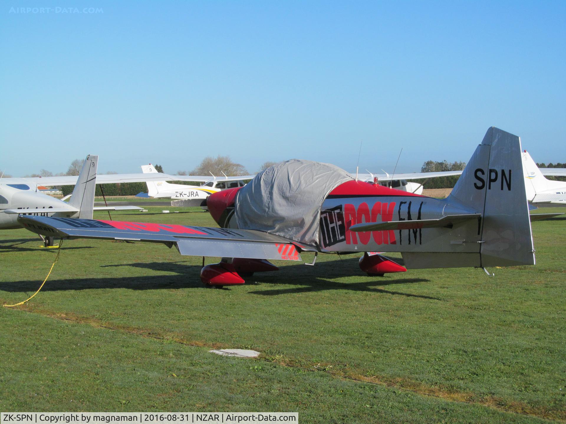 ZK-SPN, Robin R-2160 Alpha Sport C/N 164, on grass club apron by great Ardmore cafe