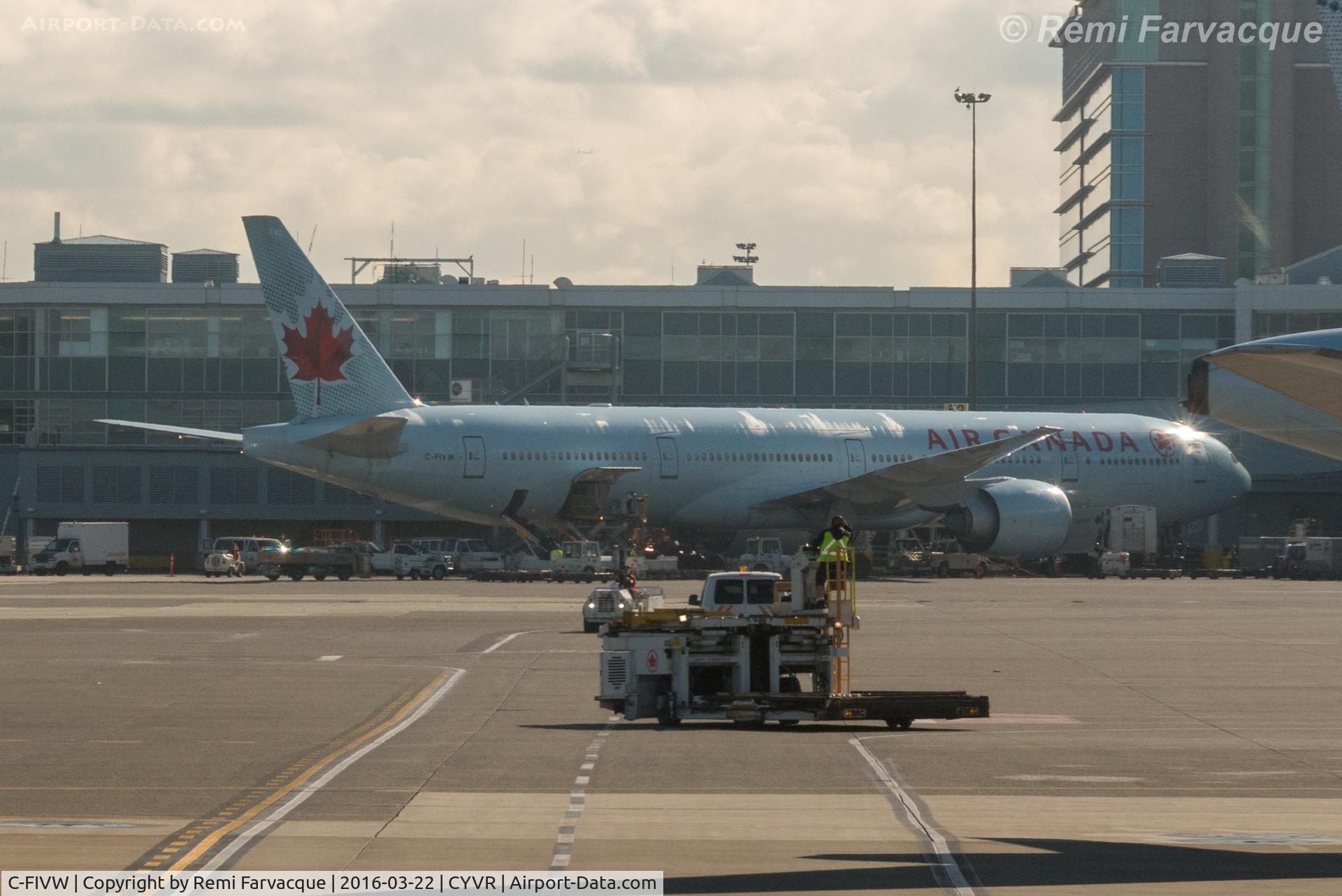 C-FIVW, 2013 Boeing 777-333/ER C/N 42218, Parked at International terminal, shot from another aircraft. AC plane #248
