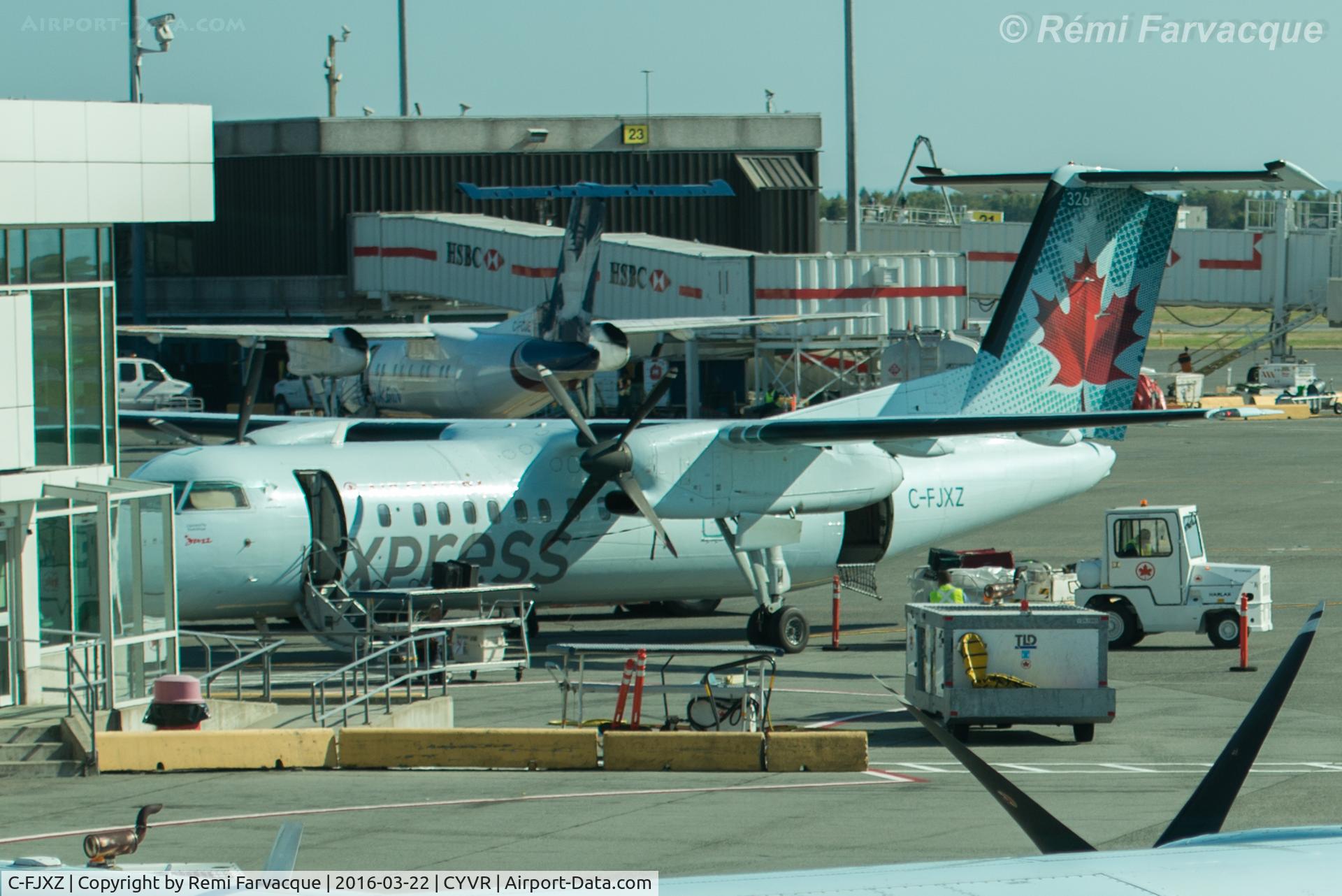 C-FJXZ, 1991 De Havilland Canada DHC-8-311 Dash 8 C/N 264, Parked at Domestic terminal. AC plane #326
