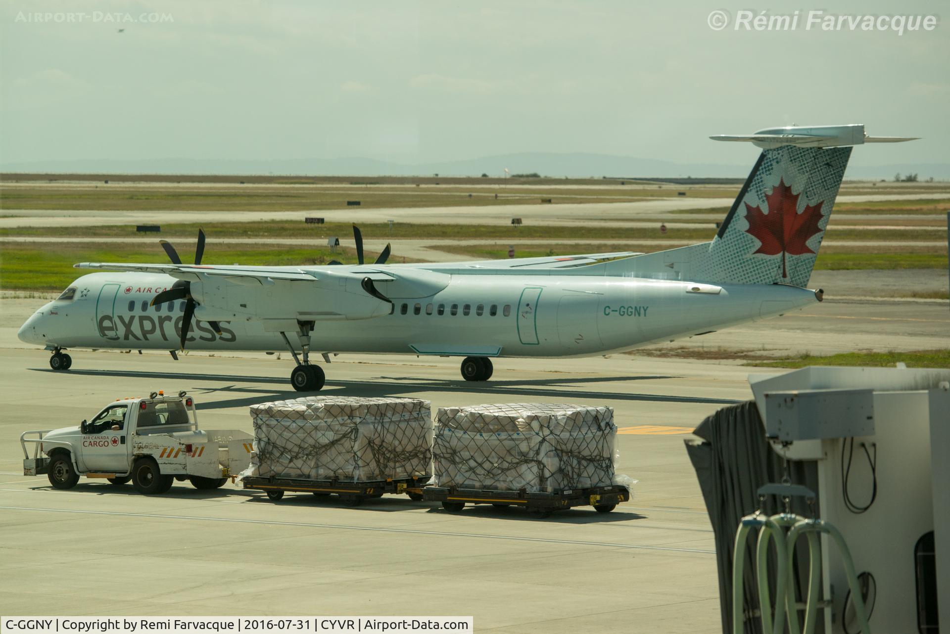 C-GGNY, 2011 Bombardier DHC-8-402 Dash 8 C/N 4386, Taxiing to domestic after arrival on north runway.