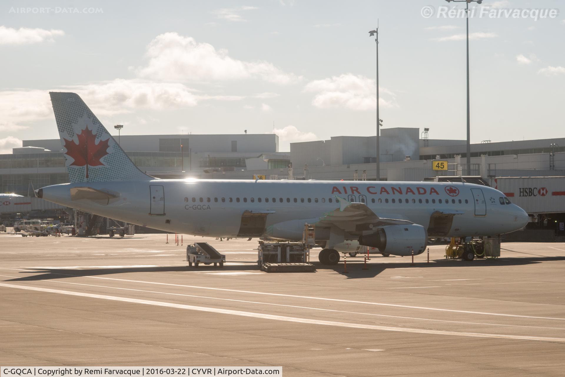 C-GQCA, 1991 Airbus A320-211 C/N 210, Drive-by from another aircraft. Parked in domestic area. AC palne #403.