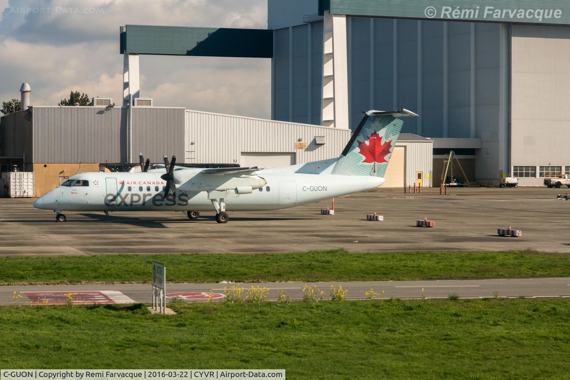 C-GUON, 1989 De Havilland Canada DHC-8-301 Dash 8 C/N 143, Parked near Air Canada maintenance hangar
