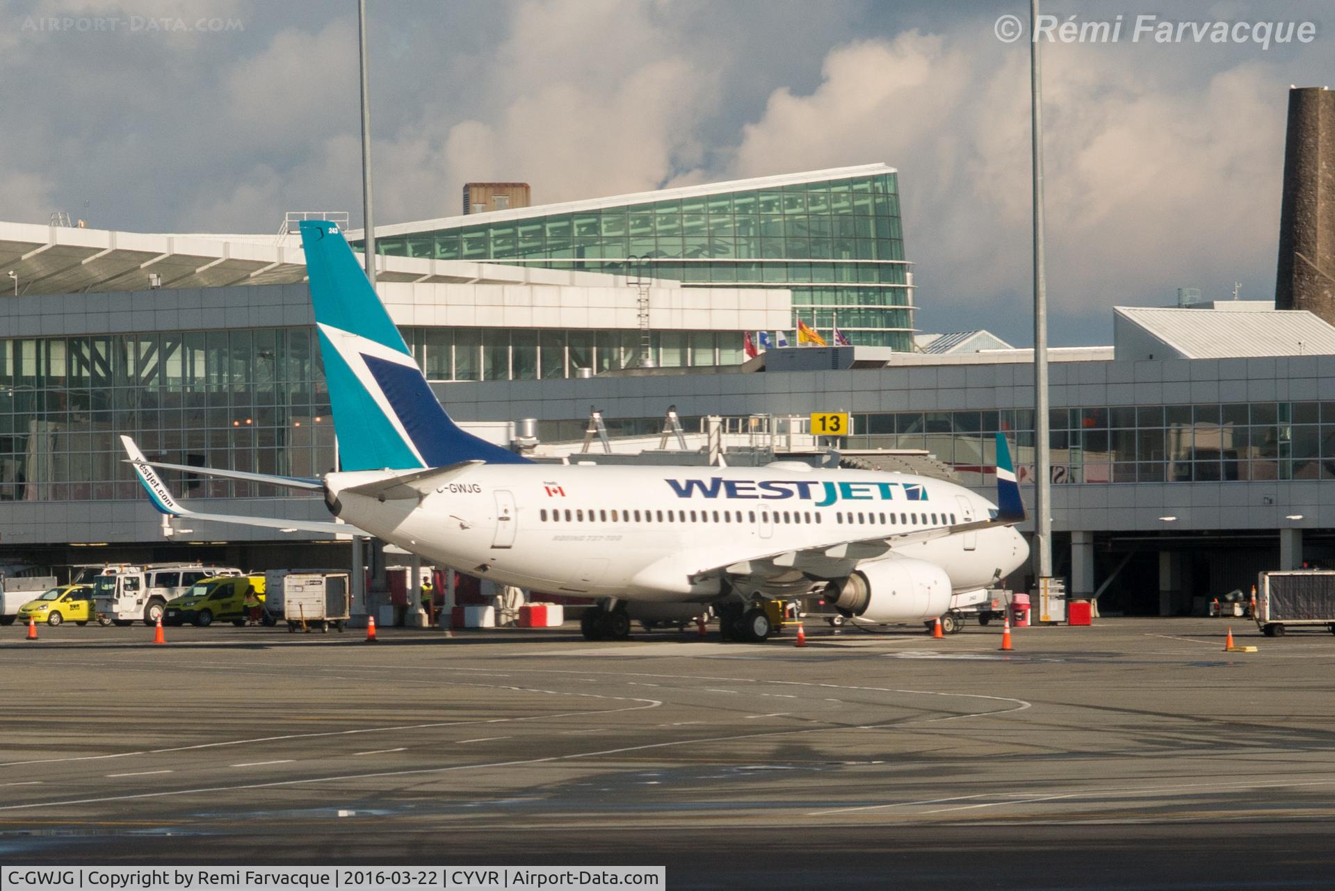 C-GWJG, 2007 Boeing 737-7CT C/N 35504, Parked at domestic termina, shot from another aircraft.