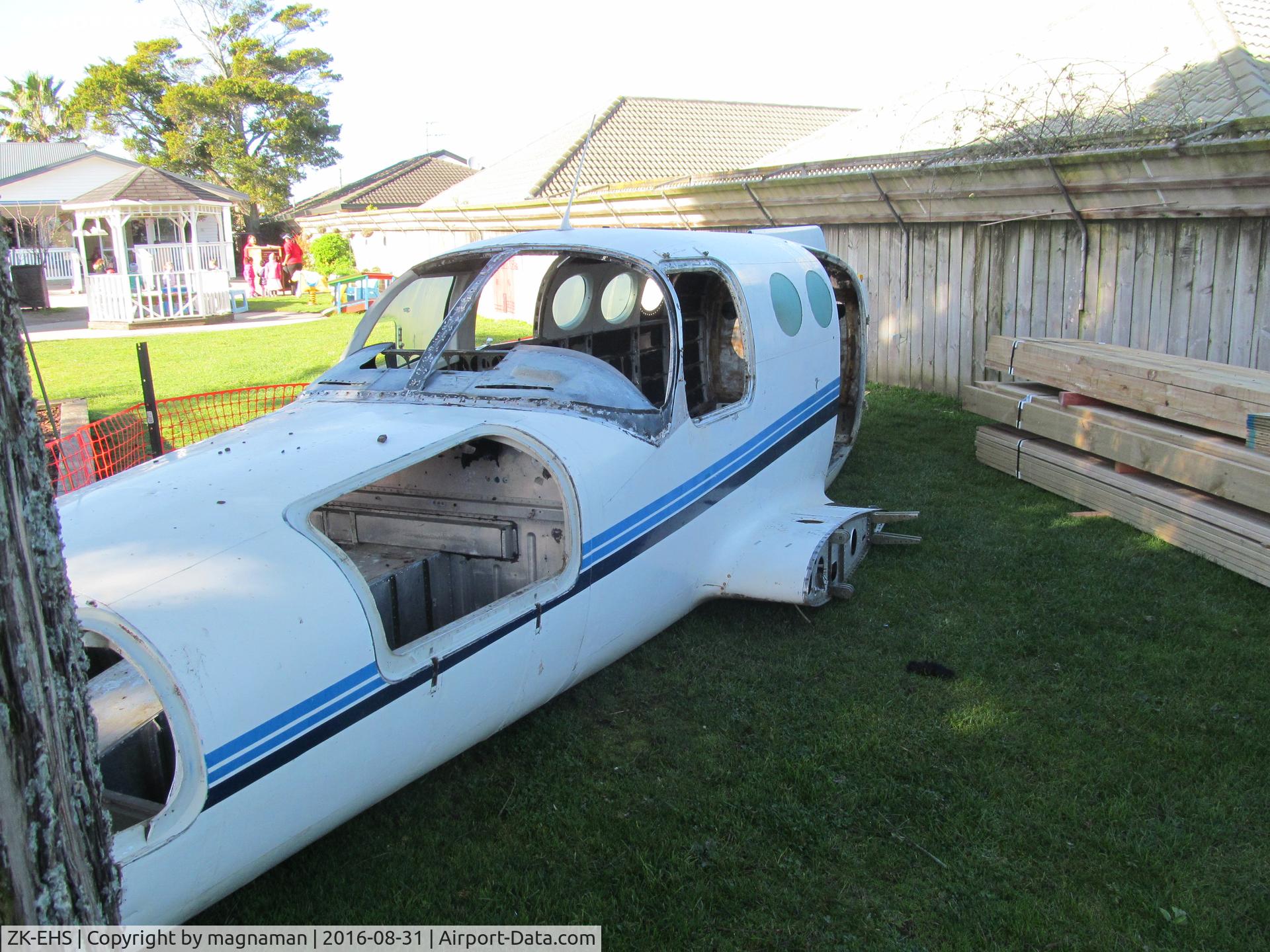 ZK-EHS, Cessna 402B C/N 402B0217, Now in an early childhood centre in south Auckland!! Can be seen from road close to entrance to the Botanic Gardens (Hill Road, Auckland)