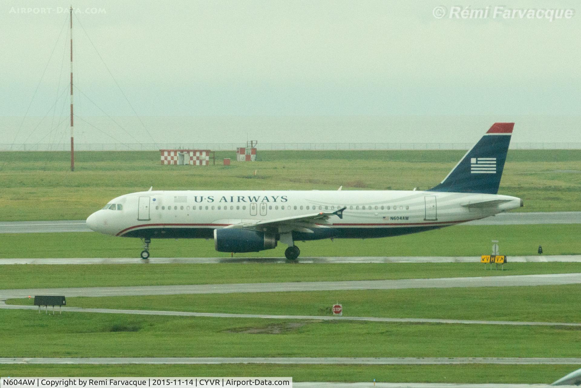 N604AW, 2000 Airbus A320-232 C/N 1196, Taxiing for take-off on south runway