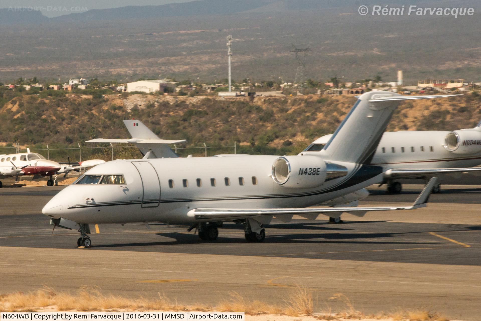 N604WB, 1996 Canadair Challenger 601-3A (CL-600-2B16) C/N 5306, Parked at north end or airport in private craft section. Taken from another airplane.