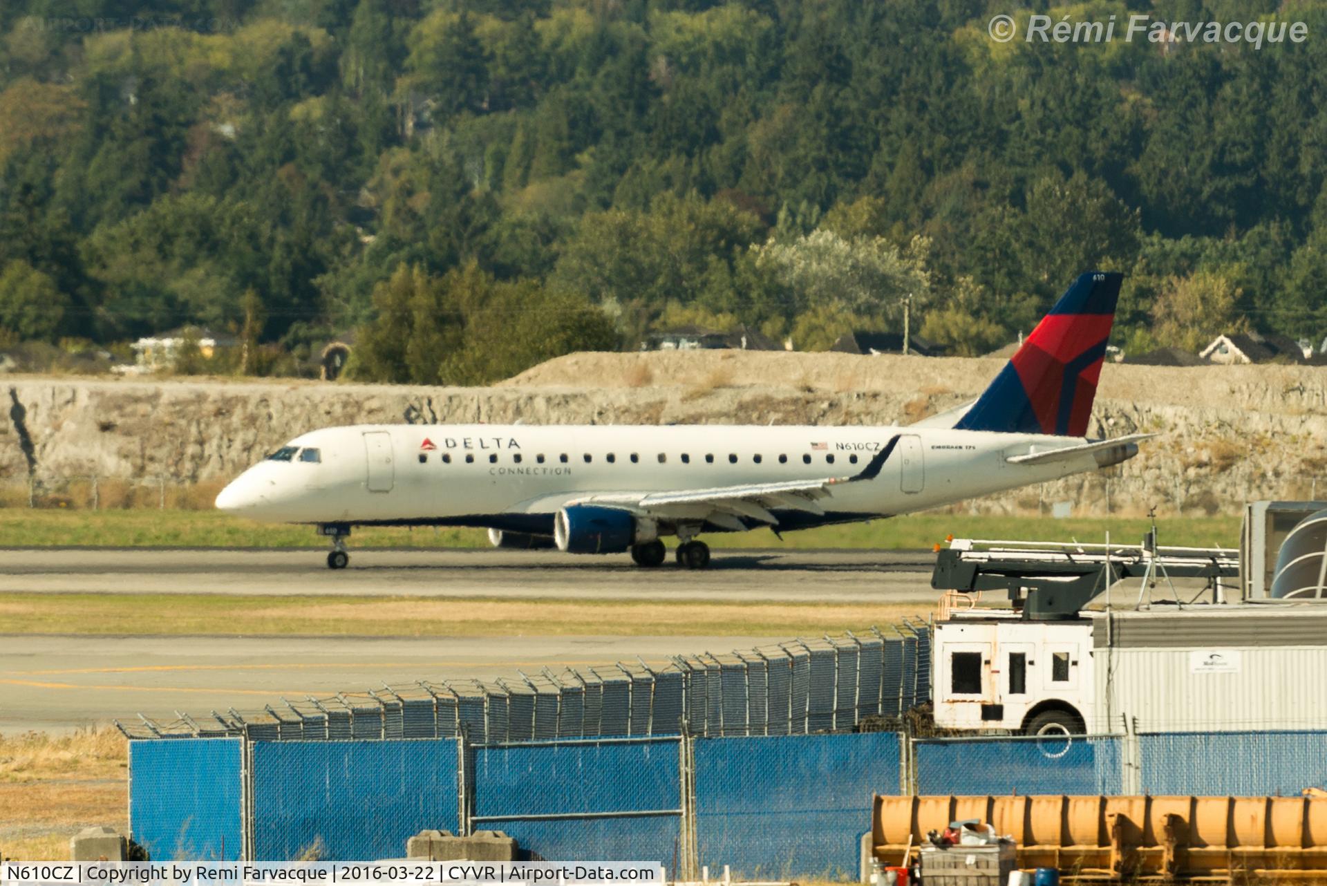 N610CZ, 2007 Embraer 175LR (ERJ-170-200LR) C/N 17000198, Taxiing off northern runway after westerly landing.