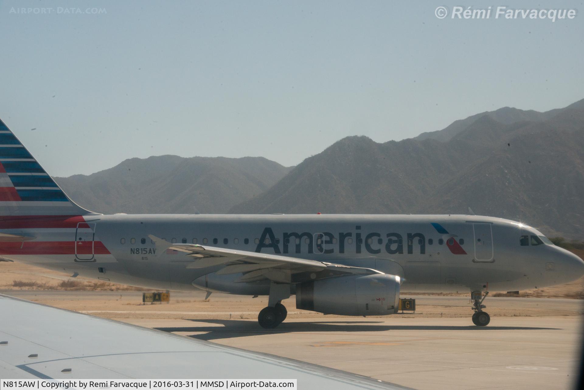 N815AW, 2000 Airbus A319-132 C/N 1323, Departing main terminal. Photo taken from another aircraft.