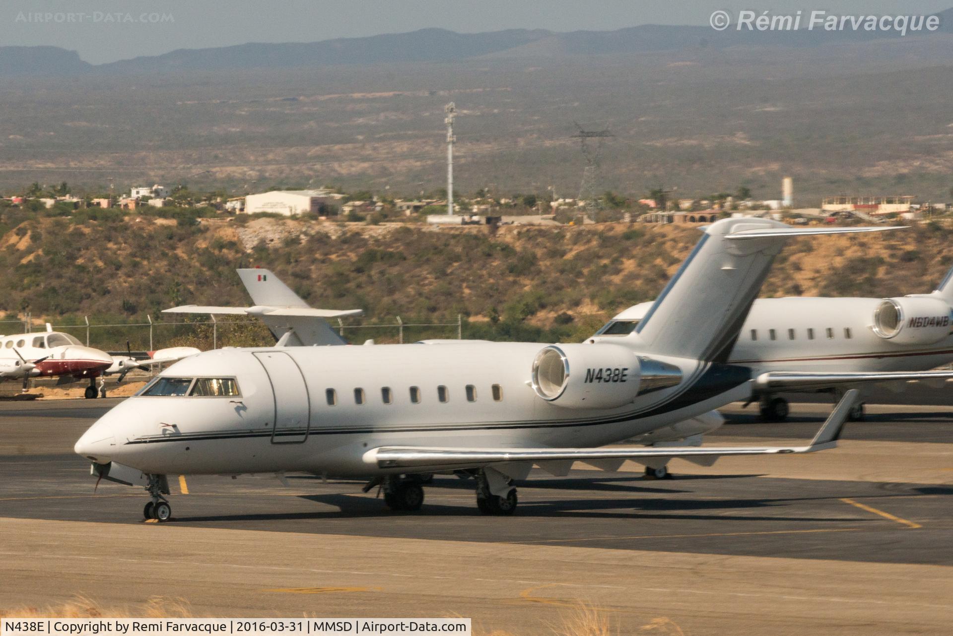 N438E, 2006 Bombardier Challenger 604 (CL-600-2B16) C/N 5646, Parked north of main terminal in private craft area. Photo shot from another aircraft.