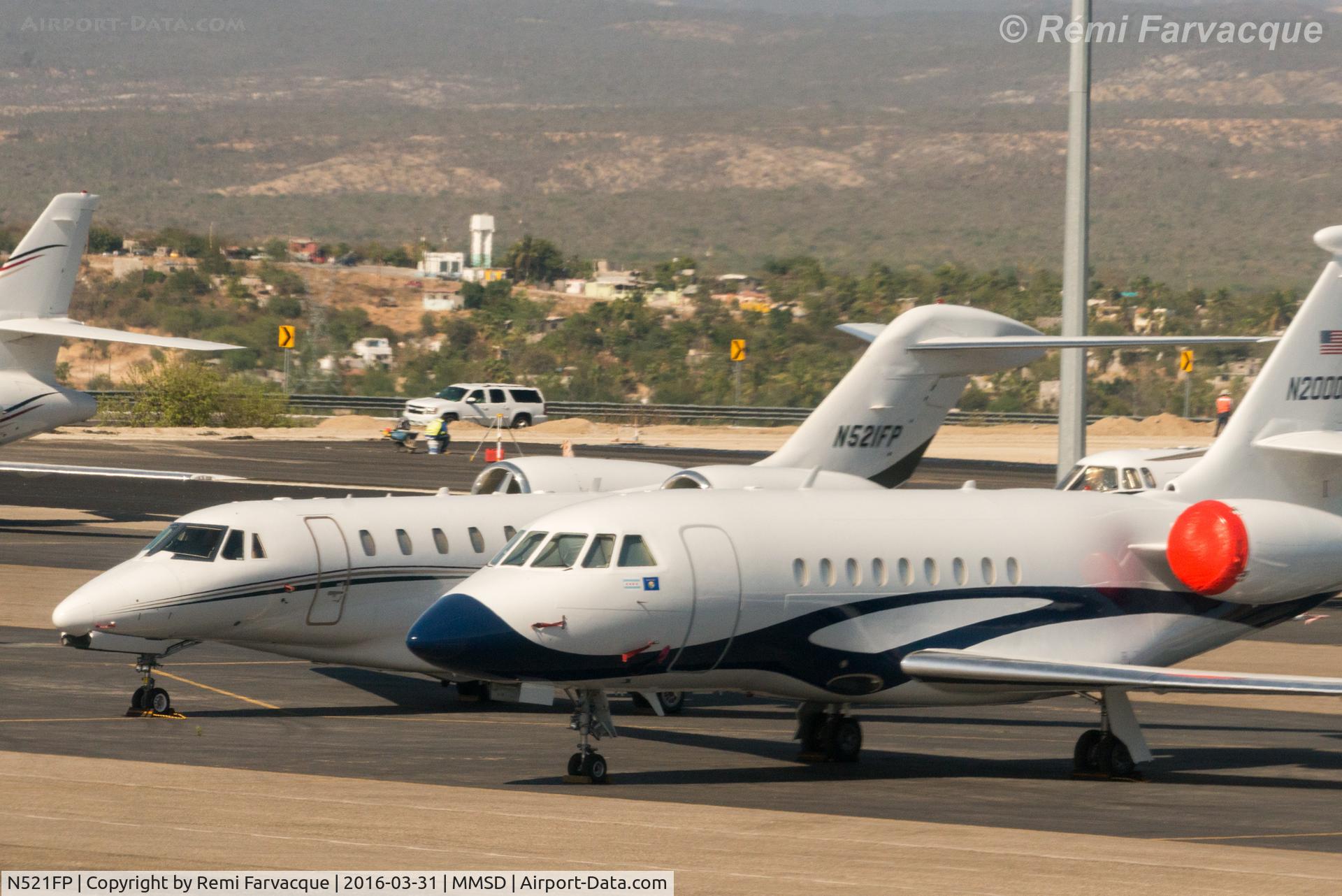N521FP, 1997 Cessna 750 Citation X C/N 750-0016, Parked north of main terminal building in private craft area. Photo shot from another aircraft.