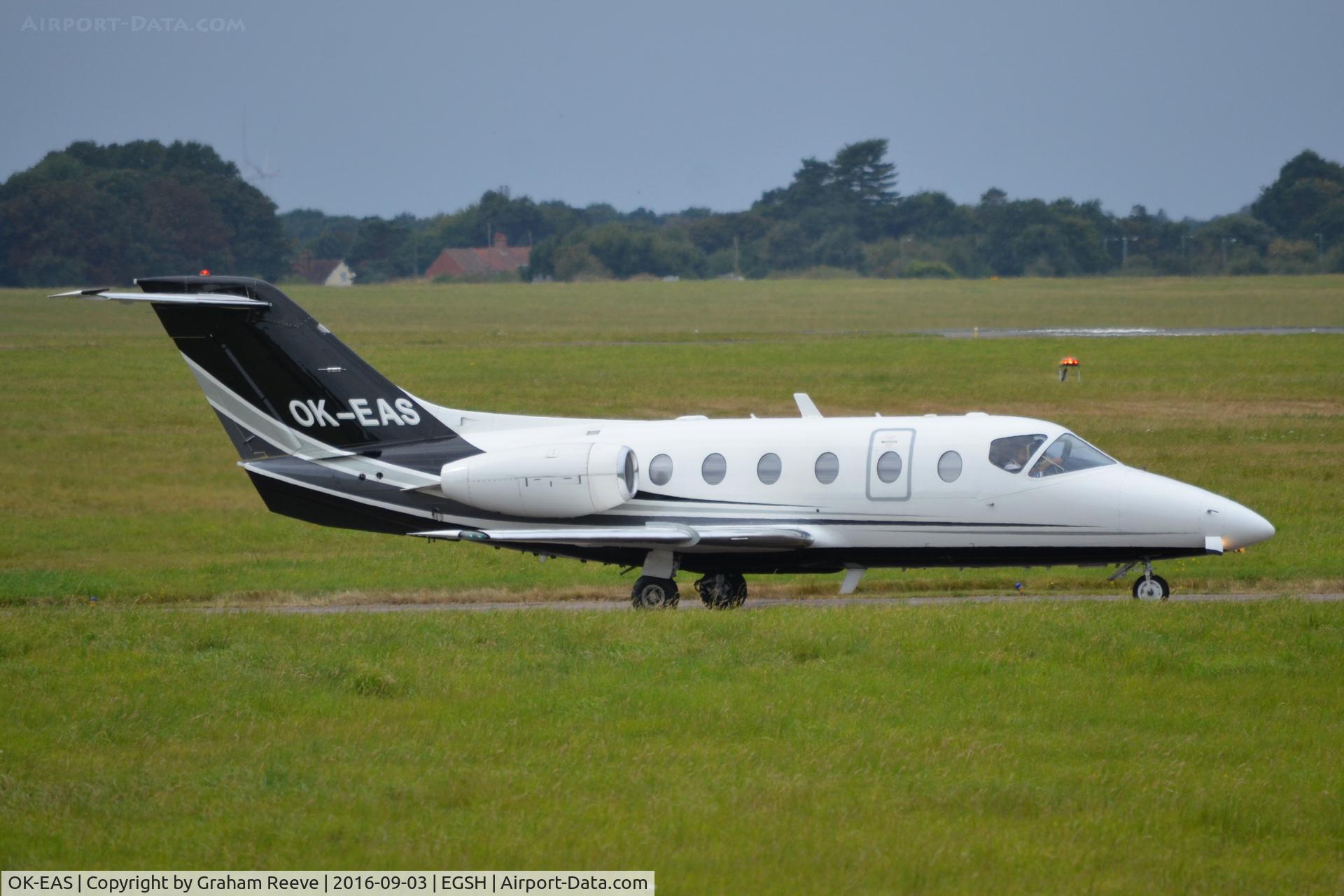 OK-EAS, 1998 Beech 400XT Nextant Beechjet C/N RK-180, About to depart from Norwich.