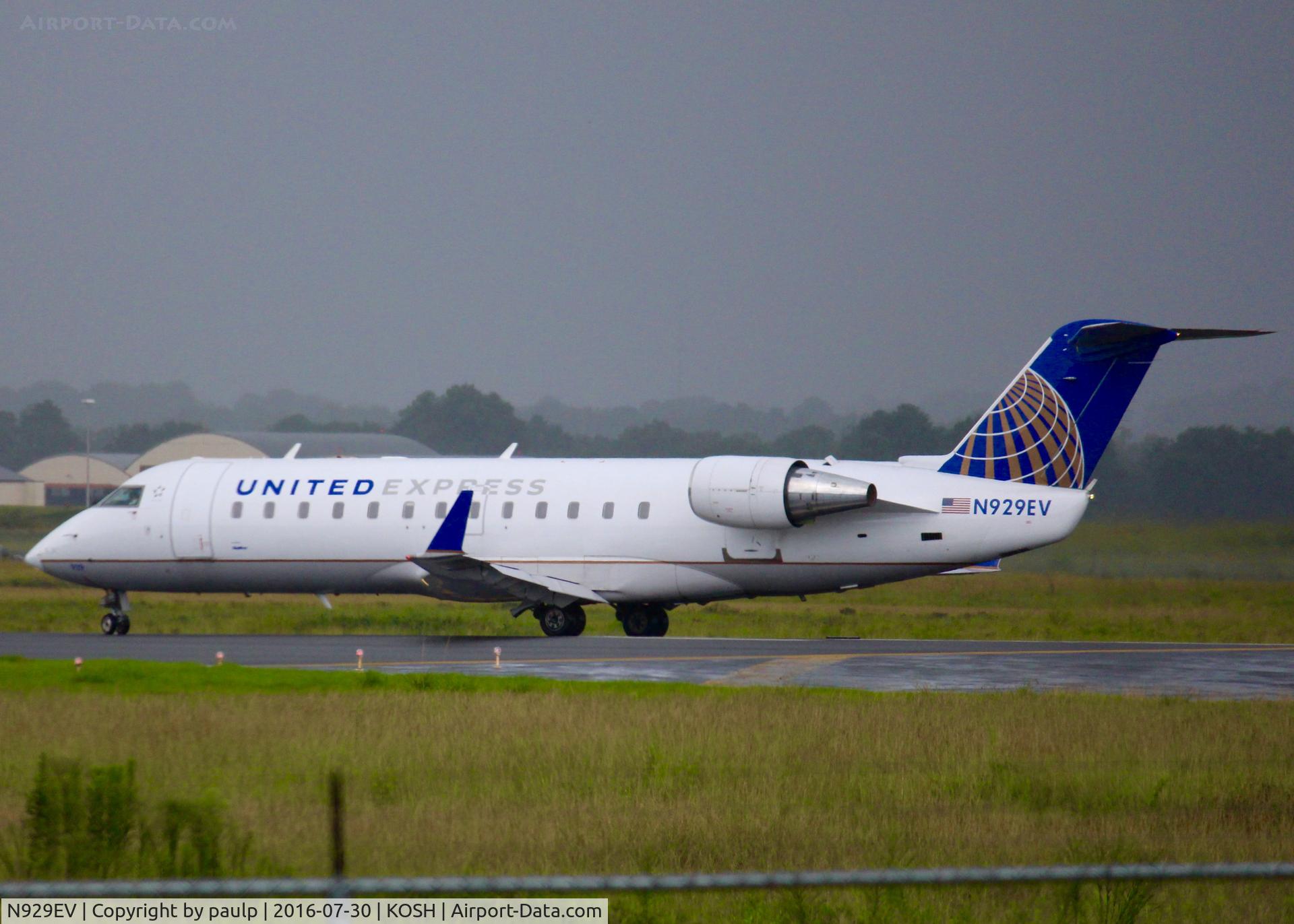 N929EV, 2004 Bombardier CRJ-200ER (CL-600-2B19) C/N 8007, At Shreveport Regional. About to climb through a heavy storm.