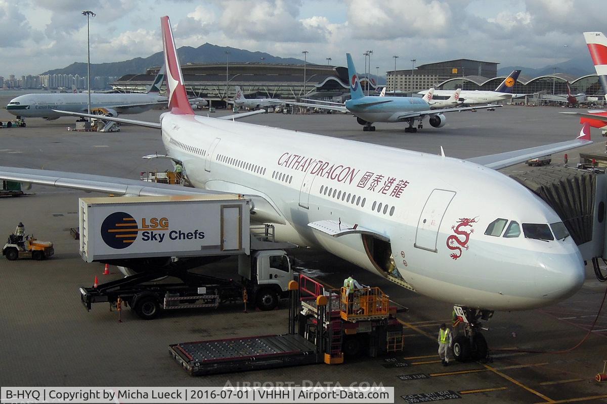 B-HYQ, 2004 Airbus A330-343X C/N 581, My first view of the new Cathay Dragon rebrand