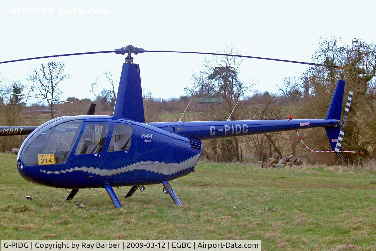 G-PIDG, 1999 Robinson R44 Astro C/N 0678, Robinson R-44 Astro [0678] Cheltenham Racecourse~G 12/03/2009