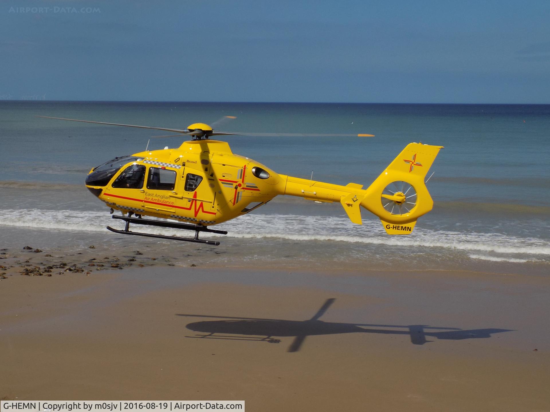 G-HEMN, 2012 Eurocopter EC-135T-2+ C/N 1070, East Anglia Air Ambulance landing on Cromer Beach to airlift a youngster with a head injury