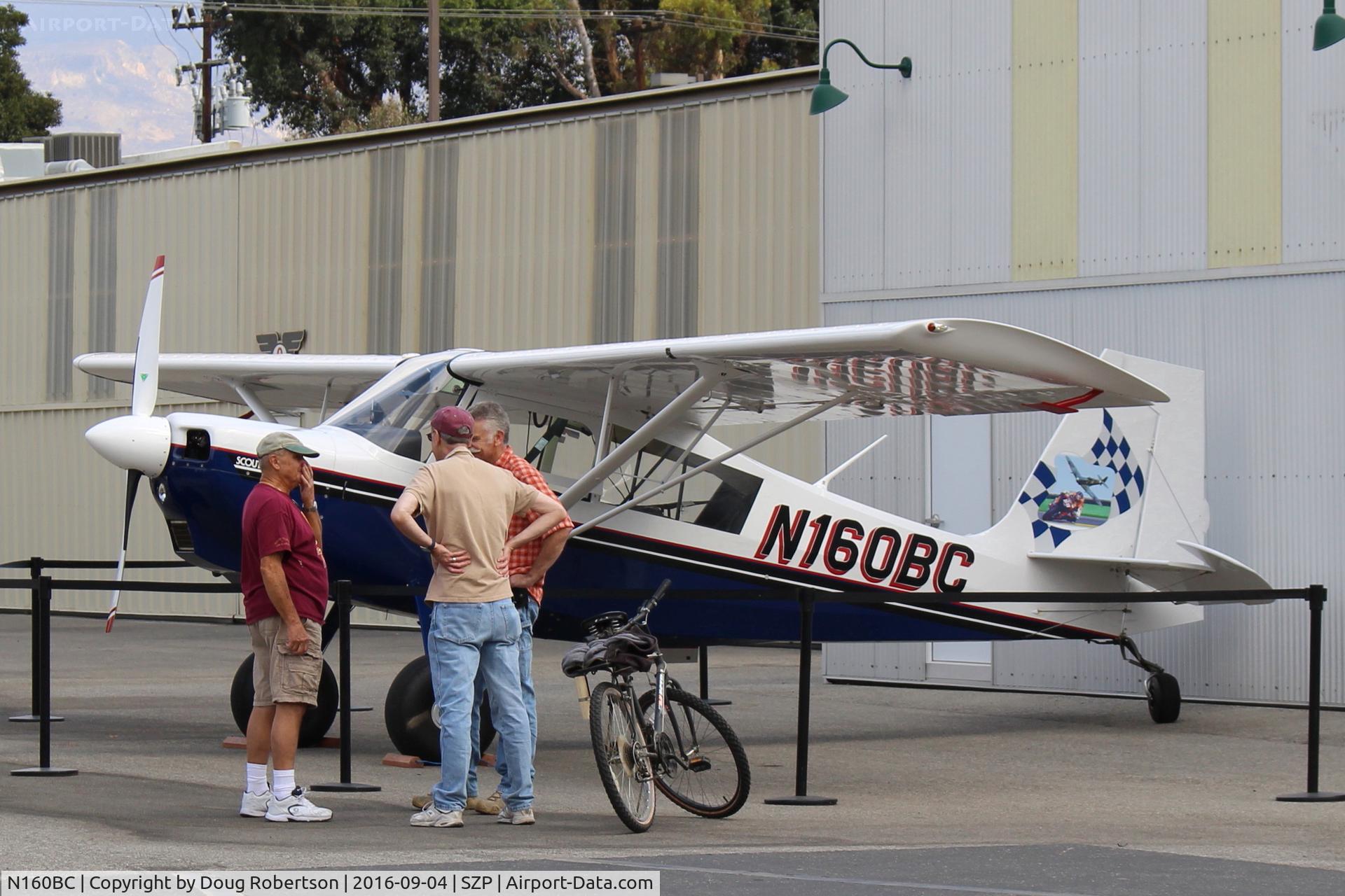 N160BC, 2004 American Champion 8GCBC Scout C/N 457-2004, 2004 American Champion 8GCBC SCOUT, Lycoming O&VO-360 180 Hp, Featured aircraft at Aviation Museum of Santa Paula First Sunday display area gets some attention.